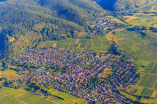 Aerial view of Winegrowing village on the edge of the Palatinate Forest from the east in Klingenmünster in the state Rhineland-Palatinate, Germany