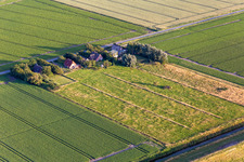 Aerial view of Farms behind the dike in the district Schülperweide in Wesselburenerkoog in the state Schleswig Holstein, Germany