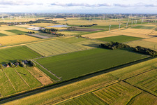 Wind turbine windmills on a field in Schuelp in the state Schleswig-Holstein, Germany