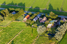 Oblique view of Schülpersieler Street in the district Schülperweide in Wesselburenerkoog in the state Schleswig Holstein, Germany