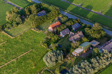Schülpersieler Street in the district Schülperweide in Wesselburenerkoog in the state Schleswig Holstein, Germany seen from above