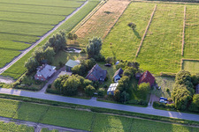 Drone image of Schülpersieler Street in the district Schülperweide in Wesselburenerkoog in the state Schleswig Holstein, Germany