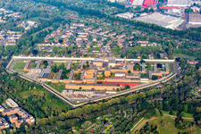 Aerial view of Prison grounds and high security fence Prison on Rochusstrasse in the district Ossendorf in Cologne in the state North Rhine-Westphalia, Germany. Editorial use only !