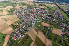 Agricultural land and field borders surround the settlement area of the village in Sickenhausen in the state Baden-Wuerttemberg, Germany