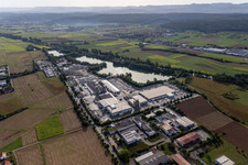 Aerial view of Industrial and commercial area on Baggersee with Wabra GmbH, Aicheler & Braun GmbH, Betonwerk, Flonmer Bauunternehmung, Haendle Haerterei GmbH,Beton Kemmler GmbH, in Hirschau in the state Baden-Wuerttemberg, Germany