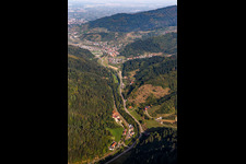 Valley landscape surrounded by mountains with B38, mill dig and Renchtal-rail-track in Lautenbach in the state Baden-Wuerttemberg, Germany