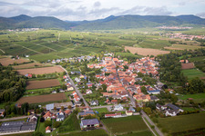 Village - view on the edge of agricultural fields and wine yards in the district Heuchelheim in Heuchelheim-Klingen in the state Rhineland-Palatinate, Germany