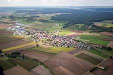 Village - view on the edge of agricultural fields and farmland in Unterhaid in the state Bavaria, Germany