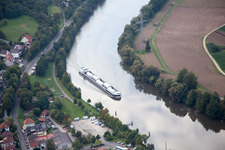 Ships and barge trains inland waterway transport in driving on the waterway of the river of the Main river in Eltmann in the state Bavaria
