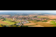 Panoramic perspective Village - view on the edge of agricultural fields and farmland in Roeschwoog in Grand Est, France