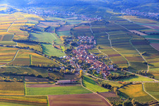 Village view between autumnal vineyards from the east in Niederhorbach in the state Rhineland-Palatinate, Germany
