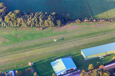 Landing on the runway of airport Schweighofen in Schweighofen in the state Rhineland-Palatinate, Germany