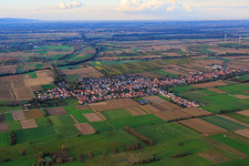 Aerial view of Village overview between autumnal fields and meadows on the Viehstrich from the south in Freckenfeld in the state Rhineland-Palatinate, Germany