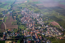Village - view on the edge of agricultural fields and farmland in Kindenheim in the state Rhineland-Palatinate, Germany