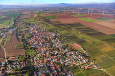 View of the village below autumnal vineyards from the east in Kindenheim in the state Rhineland-Palatinate, Germany