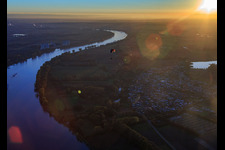 Course of the Rhine south to the Biblis nuclear power plant at sunset in Hamm am Rhein in the state Rhineland-Palatinate, Germany