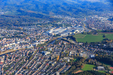 Aerial view of View of the town from both sides of the Murg river from the southwest in front of the Daimler Truck AG factory premises in Gaggenau in the state Baden-Wuerttemberg, Germany
