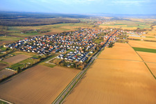 Aerial photograpy of Village overview in winter on the B427 from the east in Minfeld in the state Rhineland-Palatinate, Germany