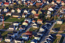 Oblique view of Holderbusch new development area from the northeast in Minfeld in the state Rhineland-Palatinate, Germany