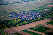 Village - view on the edge of agricultural fields and farmland in Venningen in the state Rhineland-Palatinate, Germany
