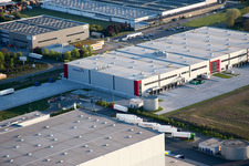 Oblique view of Industrial and commercial area NO with Grieshaber Logistic Group AG in Biebesheim am Rhein in the state Hesse, Germany