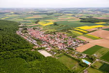 Village - view on the edge of agricultural fields and farmland in Schraudenbach in the state Bavaria, Germany