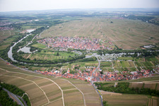 Aerial view of Village on the river bank areas of the loop of the river in Volkach in the state Bavaria, Germany