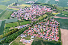 Village - view on the edge of agricultural fields and farmland in Sulzheim in the state Bavaria, Germany