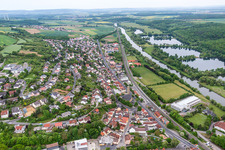 Aerial view of Village on the river bank areas of the Main river in Schonungen in the state Bavaria, Germany