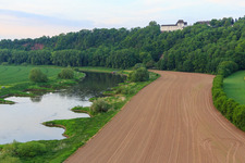 FÜRSTENBERG CASTLE MUSEUM above the Weser in Fürstenberg in the state Lower Saxony, Germany out of the air