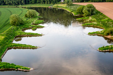 Riparian zones on the course of the river Weser mit Anglern in Fuerstenberg in the state Lower Saxony