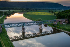 Viaduct of the railway bridge structure to route the railway tracks crossing the Weser river in Hoexter in the state North Rhine-Westphalia