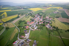 Village - view on the edge of agricultural fields and farmland in Bad Pyrmont in the state Lower Saxony, Germany