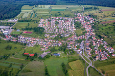 Aerial view of Village - view on the edge of agricultural fields and farmland in Voelkersbach in the state Baden-Wurttemberg, Germany