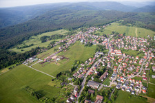 Aerial view of Village - view on the edge of agricultural fields and farmland in Dobel in the state Baden-Wurttemberg