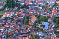 Aerial view of Church of St. Mary Assumption and Catholic Parish Hall of St. Mary Assumption in Herxheim bei Landau in the state Rhineland-Palatinate, Germany