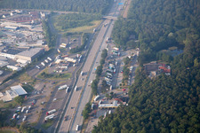 Aerial view of Motorway service area on the edge of the course of BAB highway A5 in Forst in the state Baden-Wurttemberg