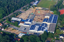 Aerial view of Quartier Lanzet from the west with construction site for new EDEKA Albrecht and Hagebau Kompakt buildings - Gillet Baustoffe GmbH in Herxheim bei Landau in the state Rhineland-Palatinate, Germany
