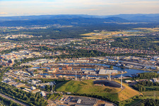 Aerial view of Verkehrs Betriebe Karlsruhe GmbH - Depot West and Windpark Deponie West (Energieberg) in front of the Karlsruhe Rhine ports from the north in the district Knielingen in Karlsruhe in the state Baden-Wuerttemberg, Germany