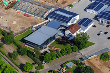 Quartier Lanzet from the west with construction site for new EDEKA Albrecht and Hagebau Kompakt buildings - Gillet Baustoffe GmbH in Herxheim bei Landau in the state Rhineland-Palatinate, Germany from above