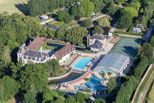 Aerial view of Facility of the Camping Capfun Château de la Grenouillere and Parc de la Grenouillère holiday park in Suèvres in the state Loir et Cher, France