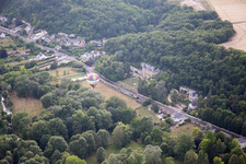 Aerial view of Hot air balloon launch in front of Chateau de Perreux in Nazelles-Negron in Centre-Val de Loire, France