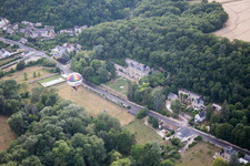 Oblique view of Hot air balloon launch in front of Chateau de Perreux in Nazelles-Negron in Centre-Val de Loire, France