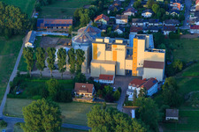 Aerial view of Silos of the grain mill Cornexo GmbH in Freimersheim in the state Rhineland-Palatinate, Germany