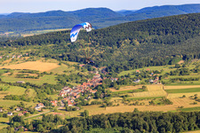 View of the town from the south with paratrike in Gœrsdorf in the state Bas-Rhin, France