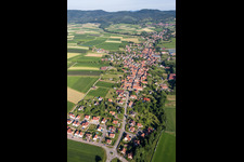 Aerial view of Village - view on the edge of agricultural fields and farmland in Steinseltz in Grand Est, France