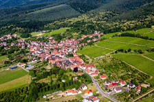 Aerial view of Village - view on the edge of agricultural fields and farmland in Rott in Grand Est, France