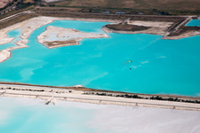 Aerial photograpy of Brown - white salt fields for salt production in Rosières-aux-Salines in the state Meurthe et Moselle, France