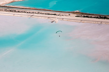 Brown - white salt fields for salt production in Rosières-aux-Salines in the state Meurthe et Moselle, France seen from above