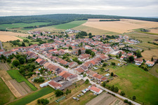 Village - view on the edge of agricultural fields and farmland in Uruffe in Grand Est, France